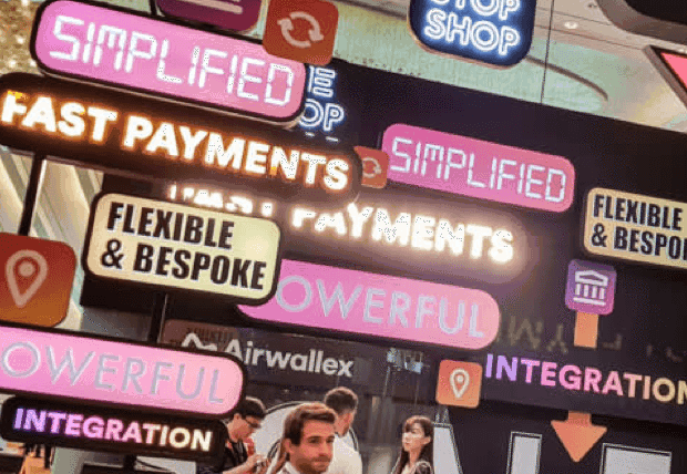 airwallex_case_study_booth_being_used_by_people
